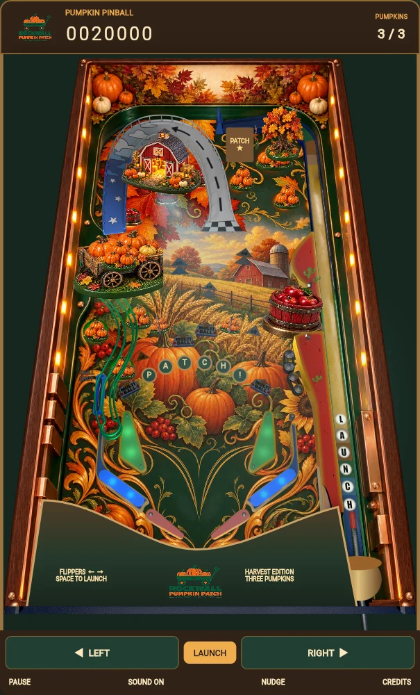 Our harvest pinball table with a pumpkin wagon, red barn, glowing rails and pumpkin ball
